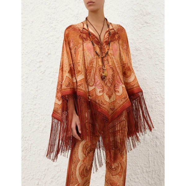 Elevate your elegance in this Zimmermann Beachwear available now at Coveti
