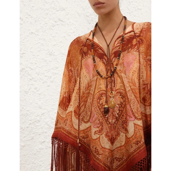 Elevate your elegance in this Zimmermann Beachwear available now at Coveti