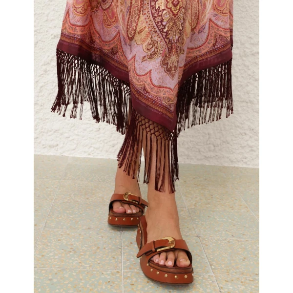 Elevate your elegance in this Zimmermann Skirts available now at Coveti