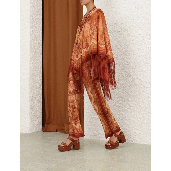 Elevate your elegance in this Zimmermann Pants available now at Coveti