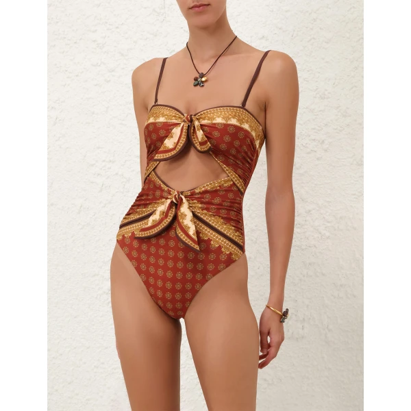 Elevate your elegance in this Zimmermann Beachwear available now at Coveti