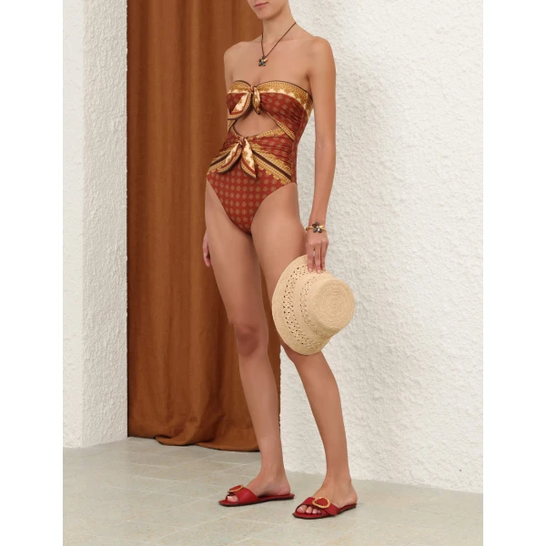 Elevate your elegance in this Zimmermann Beachwear available now at Coveti