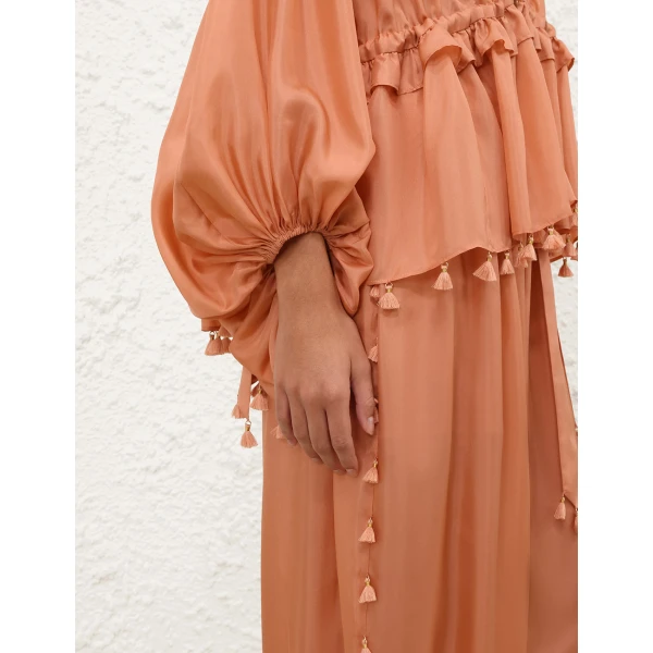 Elevate your elegance in this Zimmermann Tops available now at Coveti