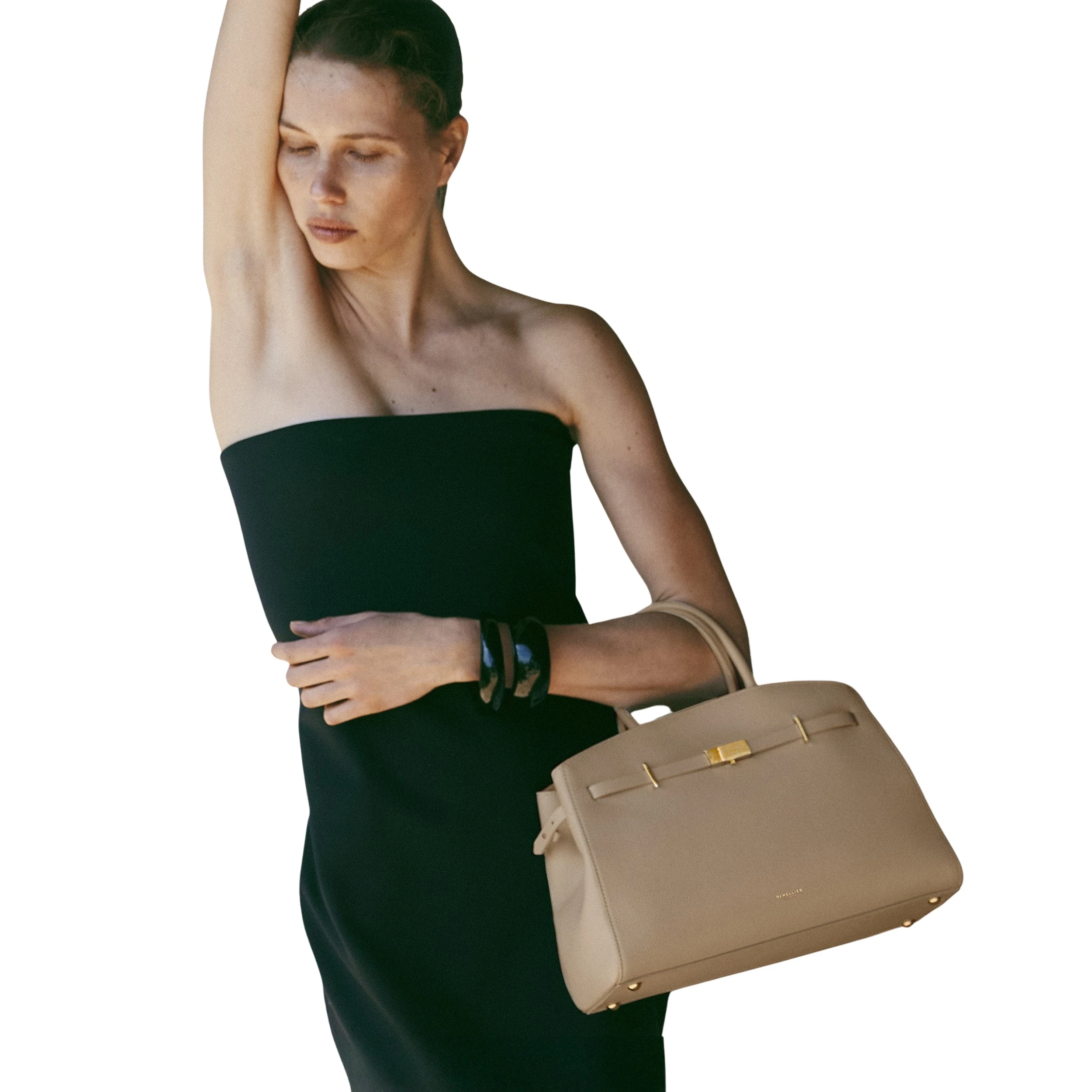 DeMellier The Midi Hudson top-handle bag in light taupe with signature lock and belted strap