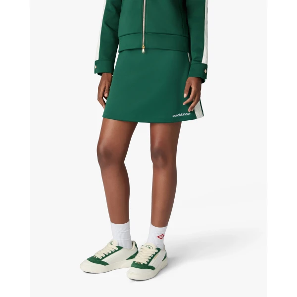 green mini skirt