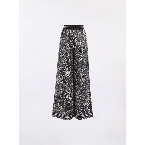 designer trousers at Coveti