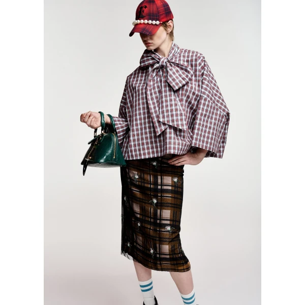 red and dark green checked pussy-bow top with trumpet sleeves