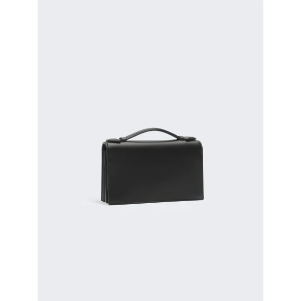 schiaparelli face clutch price