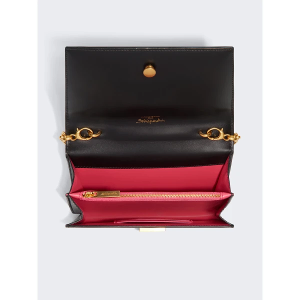 schiaparelli face clutch