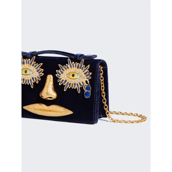 schiaparelli face clutch