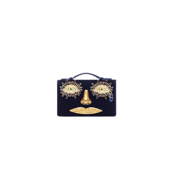 schiaparelli face clutch
