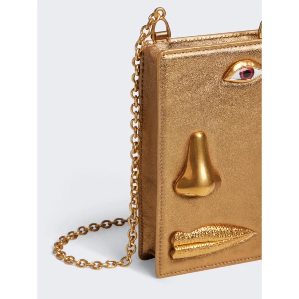 schiaparelli face phone pouch price