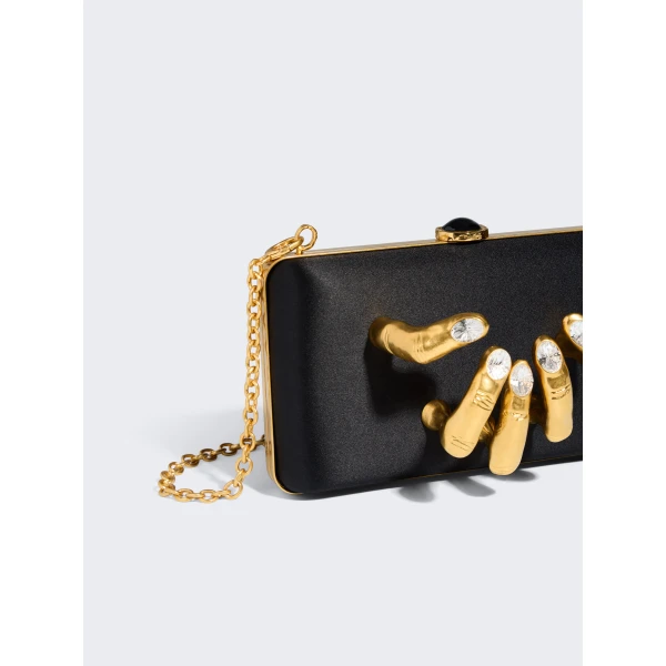 schiaparelli hand in hand clutch price