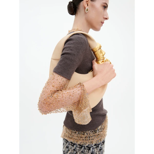 Schiaparelli piercings top
