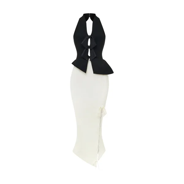 Rasario Midi dress with an asymmetrical cutout and a peplum in Black and White