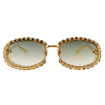 Anna-Karin Karlsson Billion $ Boo Sunglasses in Gold Emerald