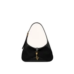JW PEI Juliette Faux Suede Key Charm East-West Shoulder Bag in Black | Shoulder & Crossbody Bags | Coveti JW PEI Juliette Faux Suede Key Charm East-West Shoulder Bag in Black