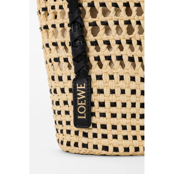 Loewe Braid pocket in iraca palm and calfskin, Natural/Black | Clutch Bags | Coveti