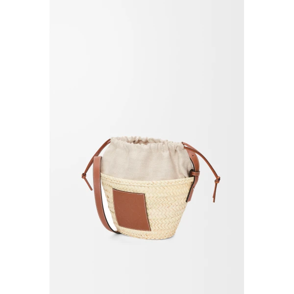 Loewe Drawstring bucket in palm leaf and calfskin, Natural/Tan | Totes & Top-Handle Bags | Coveti