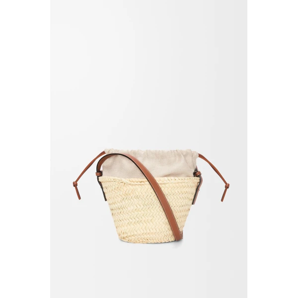 Loewe Drawstring bucket in palm leaf and calfskin, Natural/Tan | Totes & Top-Handle Bags | Coveti