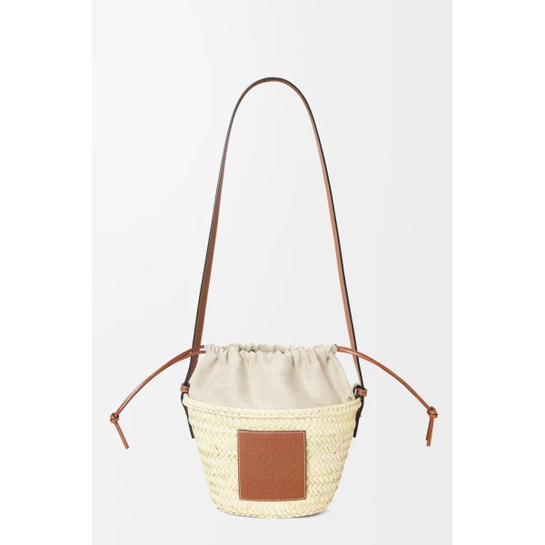 Loewe Drawstring bucket in palm leaf and calfskin, Natural/Tan | Totes & Top-Handle Bags | Coveti