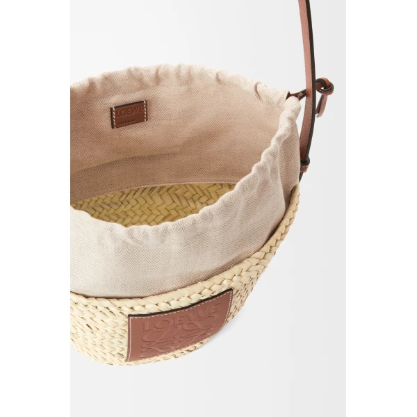 Loewe Drawstring bucket in palm leaf and calfskin, Natural/Tan | Totes & Top-Handle Bags | Coveti