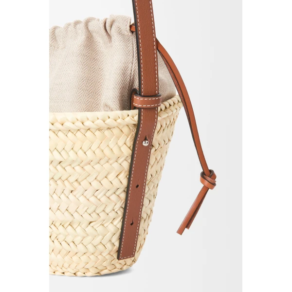 Loewe Drawstring bucket in palm leaf and calfskin, Natural/Tan | Totes & Top-Handle Bags | Coveti