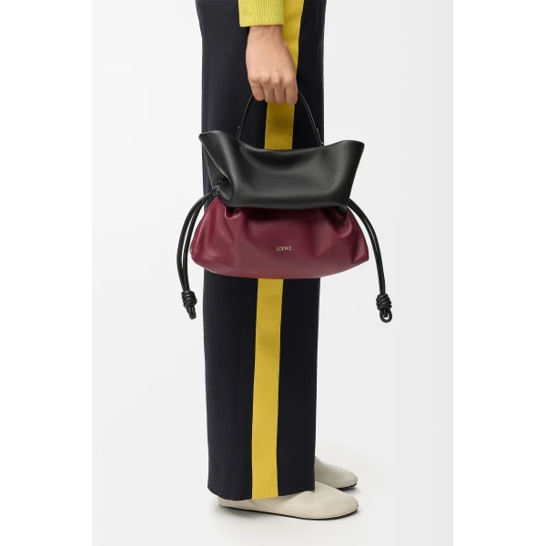 Loewe Flamenco Rolled bag in bicolour mellow nappa lambskin, Black/Copper Red | Shoulder & Crossbody Bags | Coveti