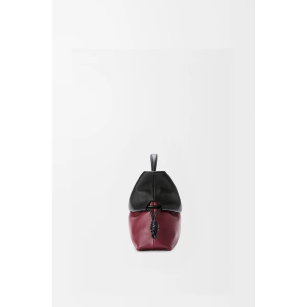 Loewe Flamenco Rolled bag in bicolour mellow nappa lambskin, Black/Copper Red | Shoulder & Crossbody Bags | Coveti