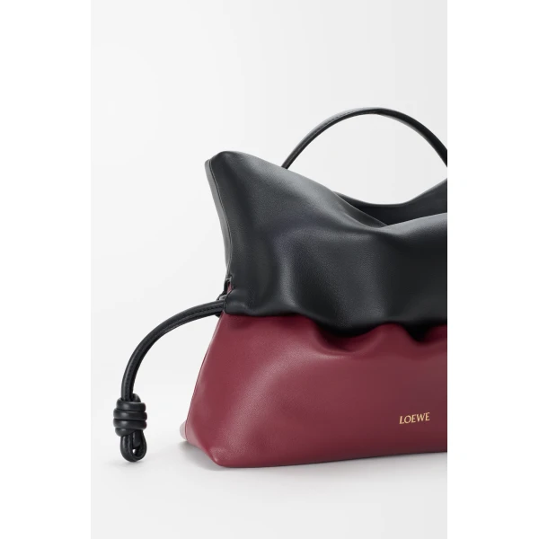 Loewe Flamenco Rolled bag in bicolour mellow nappa lambskin, Black/Copper Red | Shoulder & Crossbody Bags | Coveti