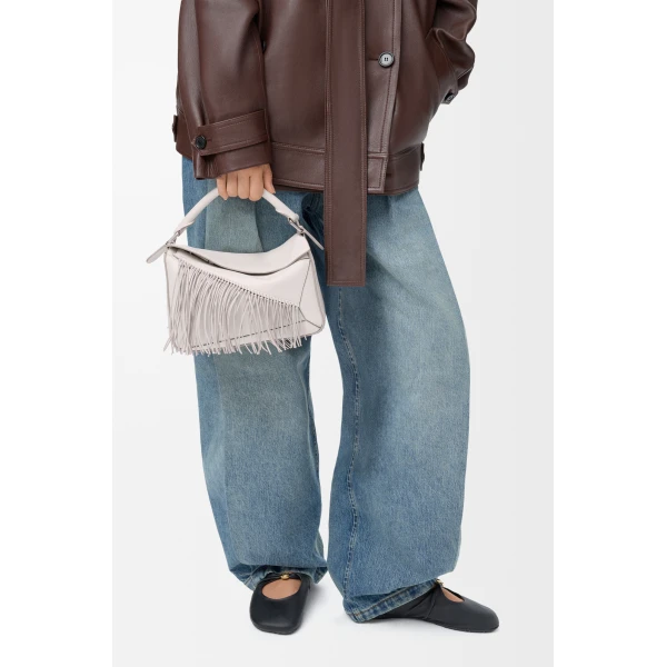 Loewe Fringe small Puzzle bag in classic calfskin, Soft White/Light Ghost | Shoulder & Crossbody Bags | Coveti