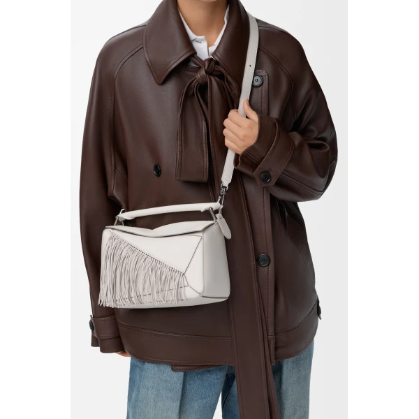 Loewe Fringe small Puzzle bag in classic calfskin, Soft White/Light Ghost | Shoulder & Crossbody Bags | Coveti