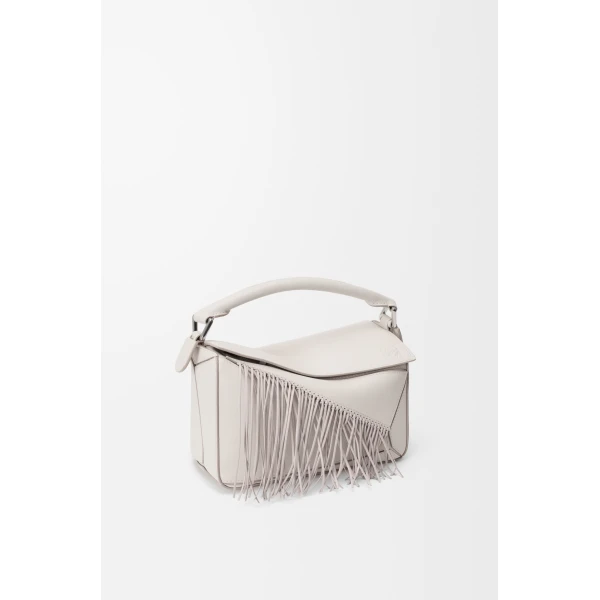 Loewe Fringe small Puzzle bag in classic calfskin, Soft White/Light Ghost | Shoulder & Crossbody Bags | Coveti
