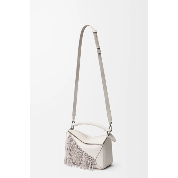 Loewe Fringe small Puzzle bag in classic calfskin, Soft White/Light Ghost | Shoulder & Crossbody Bags | Coveti
