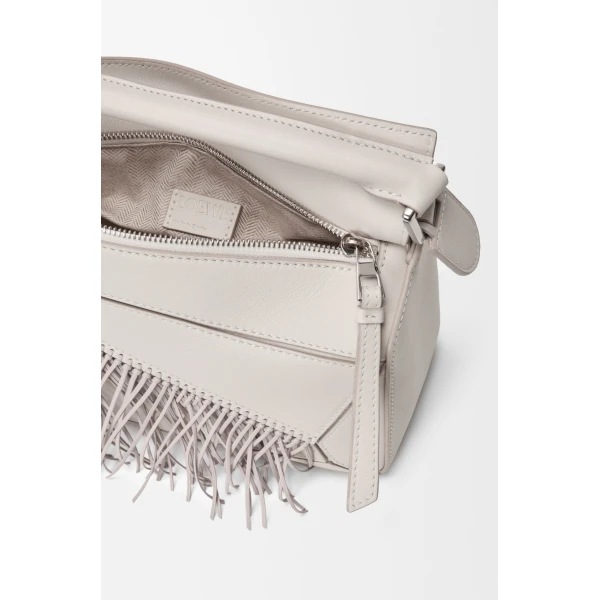 Loewe Fringe small Puzzle bag in classic calfskin, Soft White/Light Ghost | Shoulder & Crossbody Bags | Coveti
