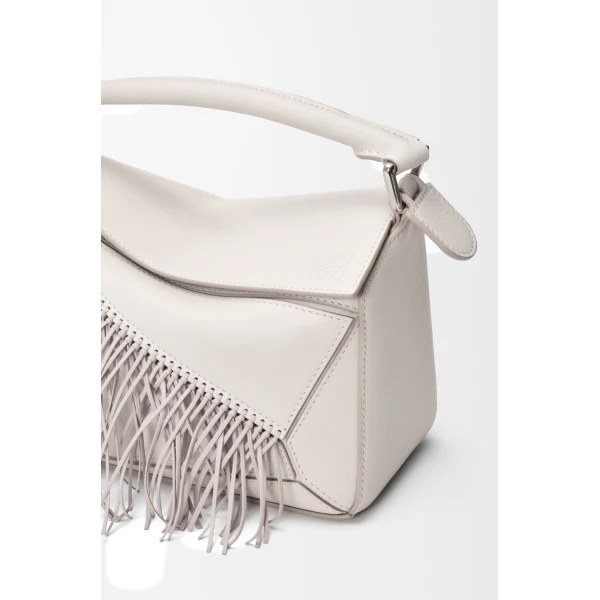 Loewe Fringe small Puzzle bag in classic calfskin, Soft White/Light Ghost | Shoulder & Crossbody Bags | Coveti