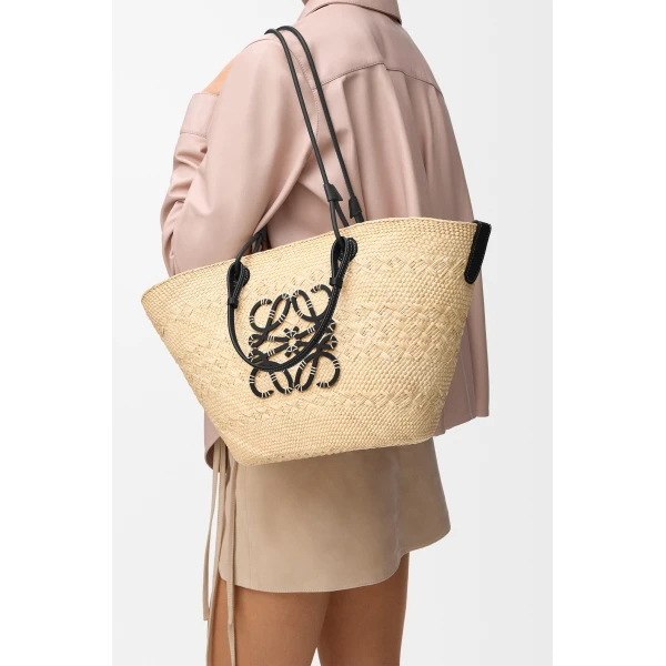 Loewe Medium Anagram Basket bag in iraca palm and calfskin, Natural/Black | Totes & Top-Handle Bags | Coveti