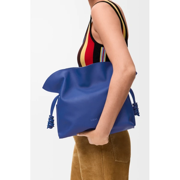 Loewe Medium Coil Flamenco clutch in nappa calfskin, Stellar Blue | Shoulder & Crossbody Bags | Coveti