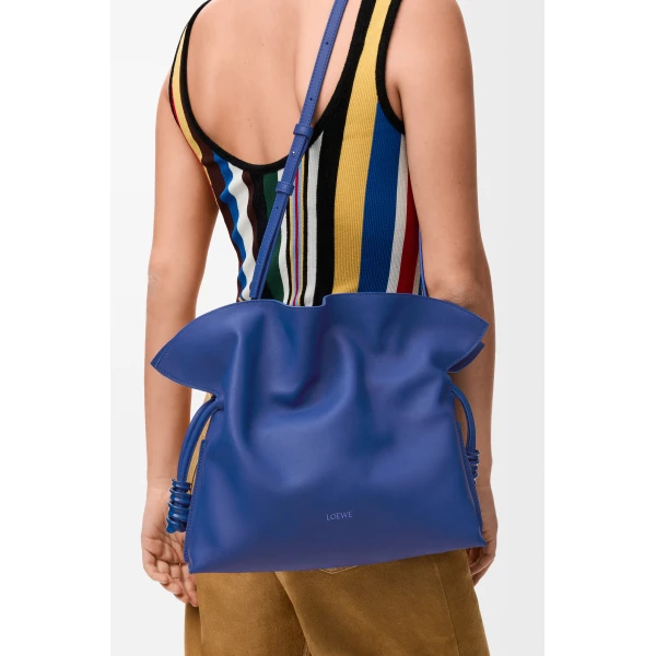 Loewe Medium Coil Flamenco clutch in nappa calfskin, Stellar Blue | Shoulder & Crossbody Bags | Coveti