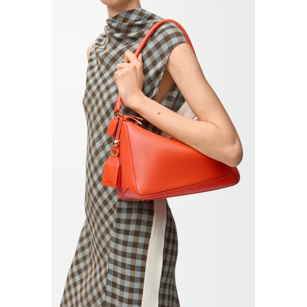 Loewe Medium Featherlight Puzzle bag in nappa lambskin, Deep Saffron | Shoulder & Crossbody Bags | Coveti