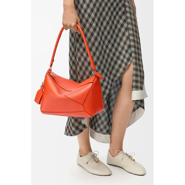 Loewe Medium Featherlight Puzzle bag in nappa lambskin, Deep Saffron | Shoulder & Crossbody Bags | Coveti