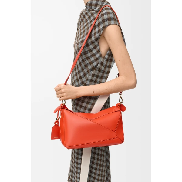 Loewe Medium Featherlight Puzzle bag in nappa lambskin, Deep Saffron | Shoulder & Crossbody Bags | Coveti