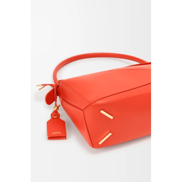 Loewe Medium Featherlight Puzzle bag in nappa lambskin, Deep Saffron | Shoulder & Crossbody Bags | Coveti