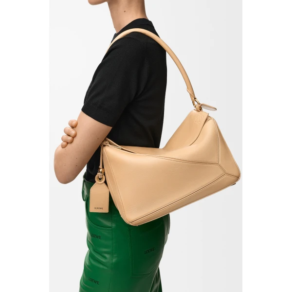 Loewe Medium Featherlight Puzzle bag in nappa lambskin, Silk Beige | Shoulder & Crossbody Bags | Coveti