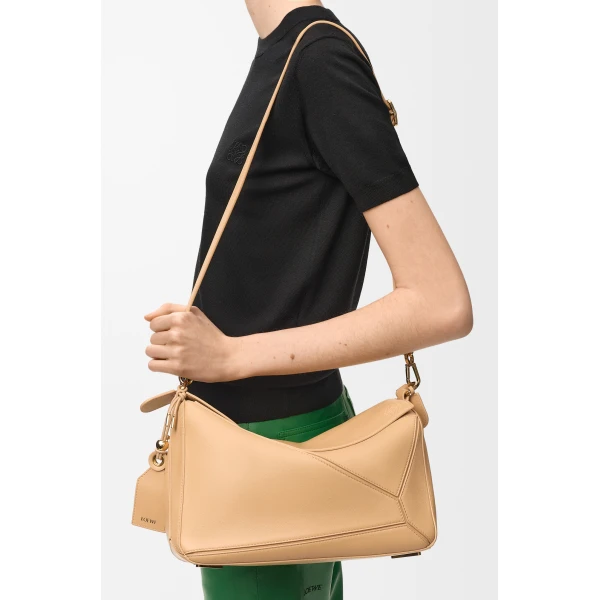 Loewe Medium Featherlight Puzzle bag in nappa lambskin, Silk Beige | Shoulder & Crossbody Bags | Coveti