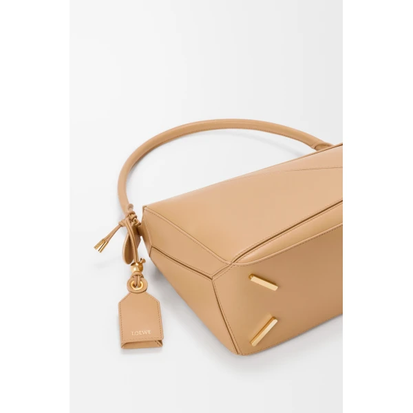 Loewe Medium Featherlight Puzzle bag in nappa lambskin, Silk Beige | Shoulder & Crossbody Bags | Coveti