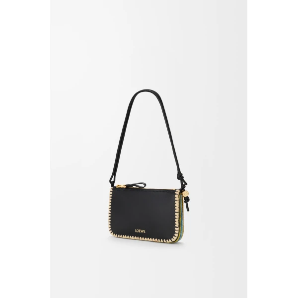 Loewe Rio pouch in classic calfskin and raffia, Black | Clutch Bags | Coveti