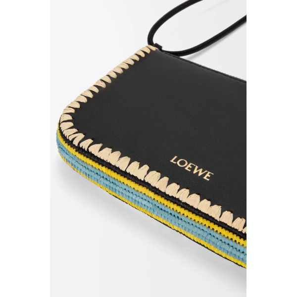 Loewe Rio pouch in classic calfskin and raffia, Black | Clutch Bags | Coveti