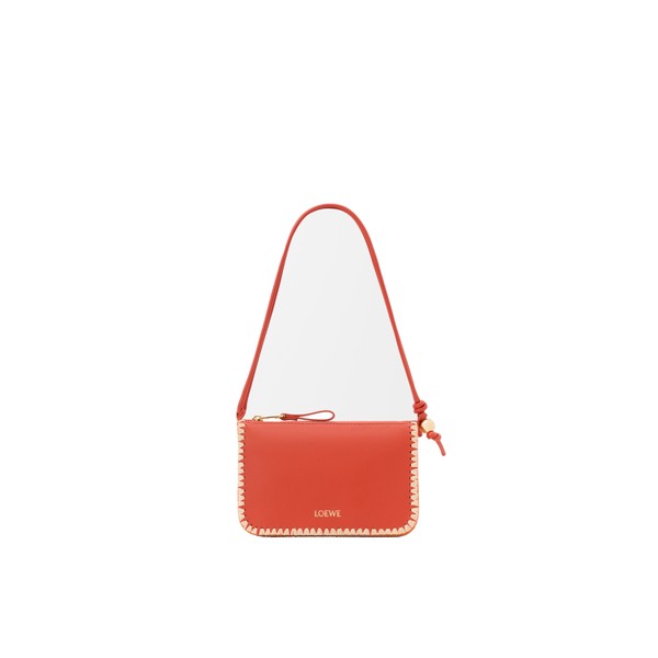 Loewe Rio pouch in classic calfskin and raffia, Deep Saffron | Clutch Bags | Coveti