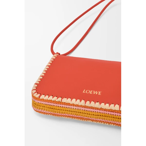 Loewe Rio pouch in classic calfskin and raffia, Deep Saffron | Clutch Bags | Coveti